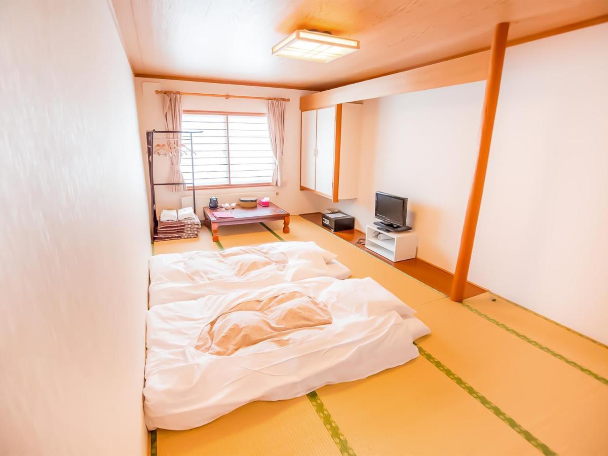 Rusutsu Lodges Pension Lilla Huset Niseko Buitenkant foto